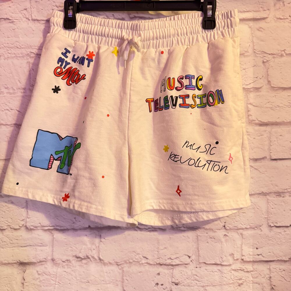 WHITE MTV SHORTS jersey type with colorful graffiti writing on shorts SZ M